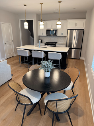 Kitchen and dining. - New 3 Bedroom Townhouse near KSU