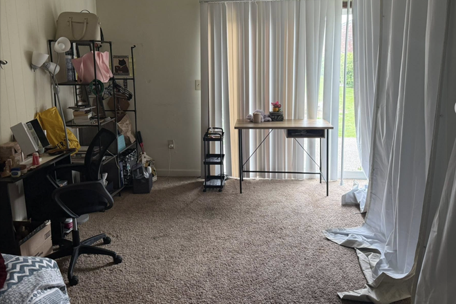 living room into a private bedroom - Townhouse of Amherst