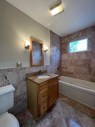 Bathroom - Huge 2 Bed 2 Bath Condo w/ 2 Car Parking + Lndry in Unit + Central Air+ Deck