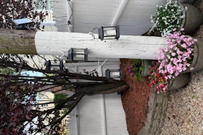 Backyard - Live in the heart of East Somerville. Room for rent in a shared home of professionals.