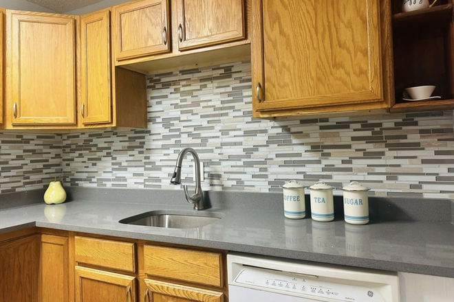 kitchen - NEW Reno, 4 bed 2 bath, heat & water included. available June 1 Apartments