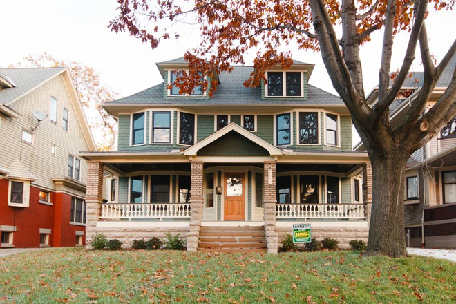 Front of home shaded by a large oak tree - Remodeled 1910 historic home by CWRU, Cleveland Clinic, & University Circle!