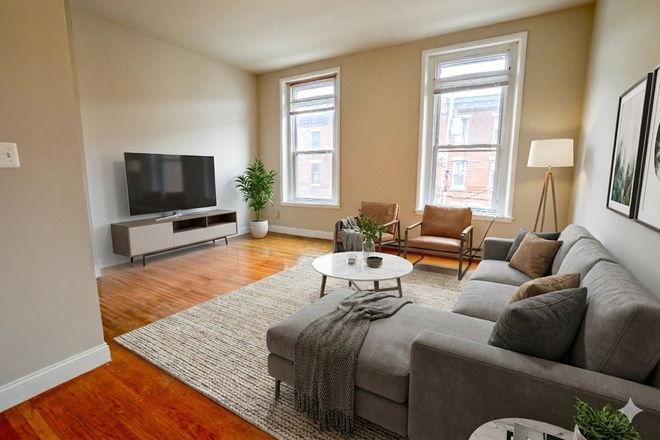 3909 Pine Living Room - 3909 Pine St Apartments