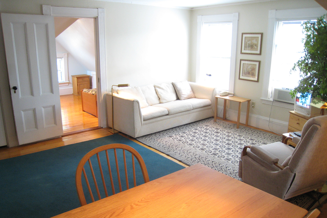 Dining area toward living room - WALK TO HARVARD. Furnished 1-Bedroom & Study, in-unit washer/dryer + all utilities included. No fee. Apartments