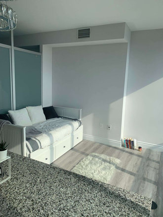 Living room - 2 bedroom 1 bathroom unit right above St. Patrick's station. Apartments