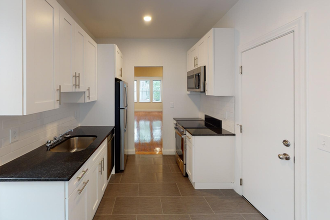 Kitchen - NO BROKER FEE! Modern Apartments Available in Cleveland Circle! H/HW Included!