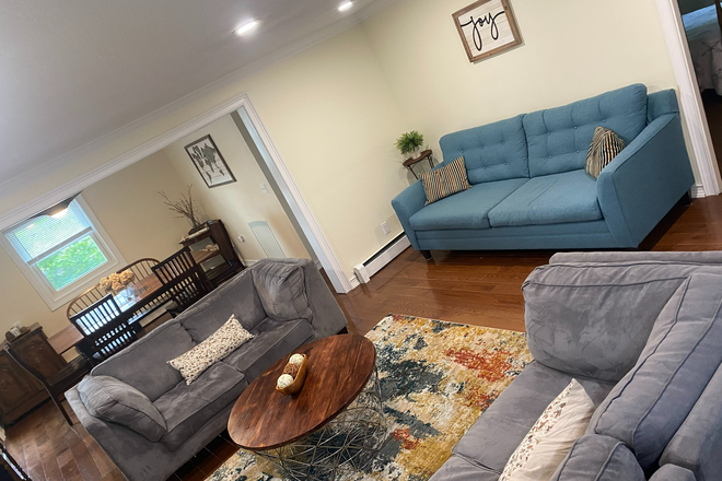 Living Room - Cozy 3 bedroom house with all utilities included.