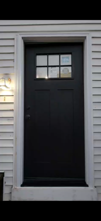 Front door - Newly renovated apartment close to train station, downtown, seaport, and South Bay