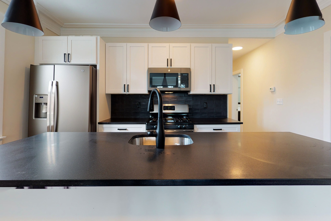 Call NOW for showings! 617-236-8600 - PARKER ST - *NO FEE!* LUXE RENOVATED 5BR DUPLEX FOR *9/1/2026* W/ IN UNIT W/D, 2 BATHS, PATIO, YARD! Apartments