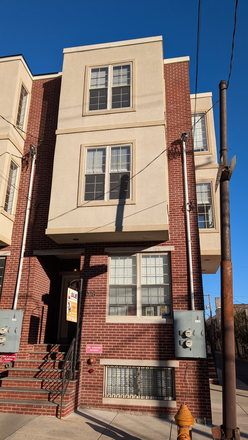 Street view of the Condo - Modern & Bright 3-BDRM Condo in Graduate Hospital area with roof deck