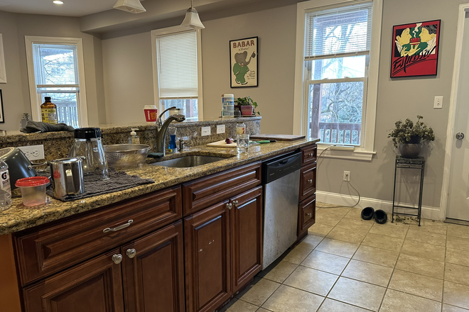 Kitchen - 3BR/1BA: Central Air + In-Unit Laundry + Private Deck Apartments