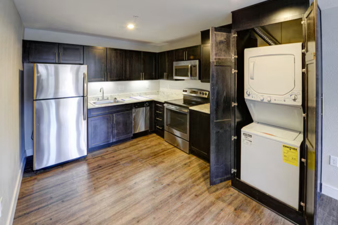Kitchen, Laundry room - East Village Flats Apartment #105