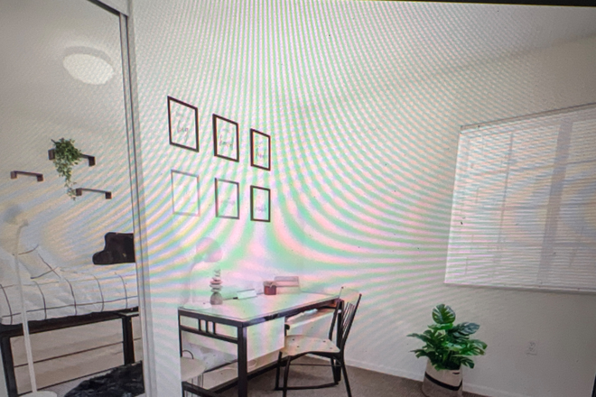 Bedroom desk area - Campus Village Apartments