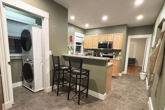 laundry bar and kitchen - 4 bedroom/2 bathroom two-level in-unit laundry with central air apartment available for Sept 2026