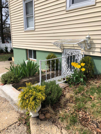 Entrance from driveway - Sunny daylight basement apartment