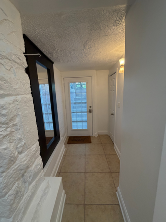 inside front entry looking out - 2302 1st Street NW Basement Apartments