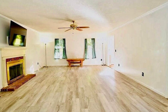 Living Room - True Privacy. Awesome 2 story house in "Camelot"