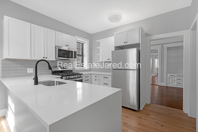 Kitchen - Price drop! Gorgeous renovated 4 bed on Glenville Ave! Apartments