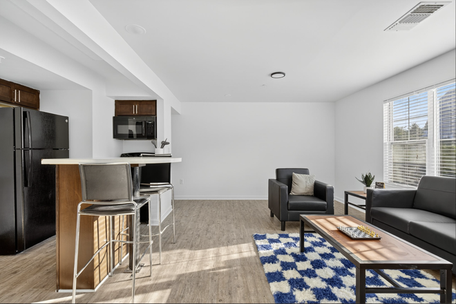 Living area/kitchen photo from Tremont website - Tremont Student Living