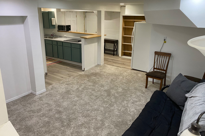 Living Room - Private Basement apartment in family home with private entrance.