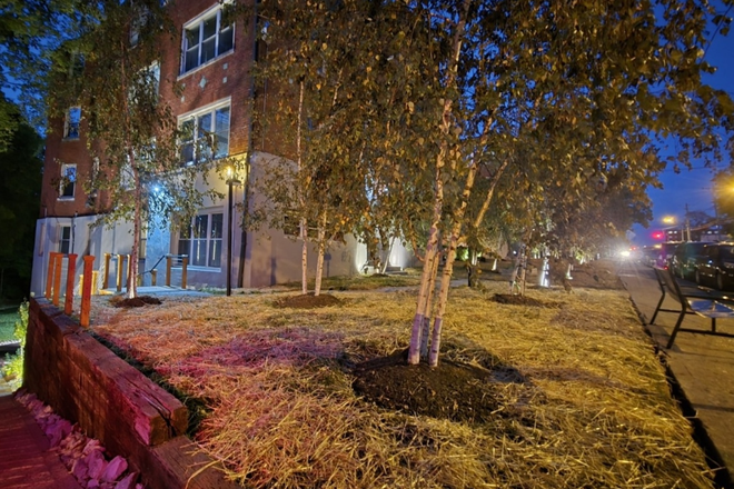 Building at night - The Inn on Forest; Free first months rent and half off security deposit. Apply now