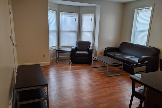 Living Room - 21 East High Street #201 Apartments