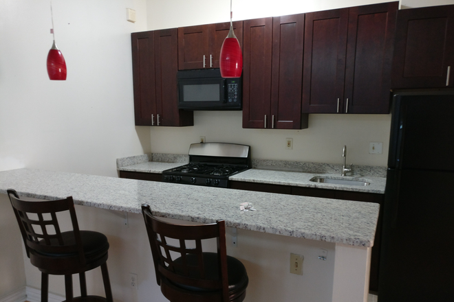 Kitchen A2 (Large Apt $1350) - Central AC Large One Bed Apt. High Ceiling, On-site Laundry