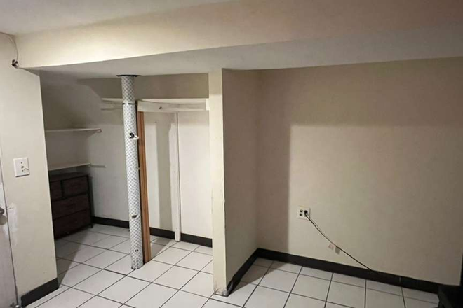 Bedroom Closet Area (Exit door to kitchen on left side) - Basement Apartment in Hollywood Neighborhood