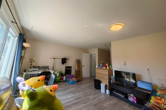 Living room - The brook for sublease Townhome