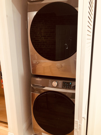 shared washer and dryer in upper level - Furnished Private Basement Suite for rent, 6 minutes from John Hopkins - Townhome