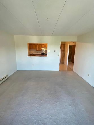 Living room - One-bedroom apartment available in Quincy Center starting November 1