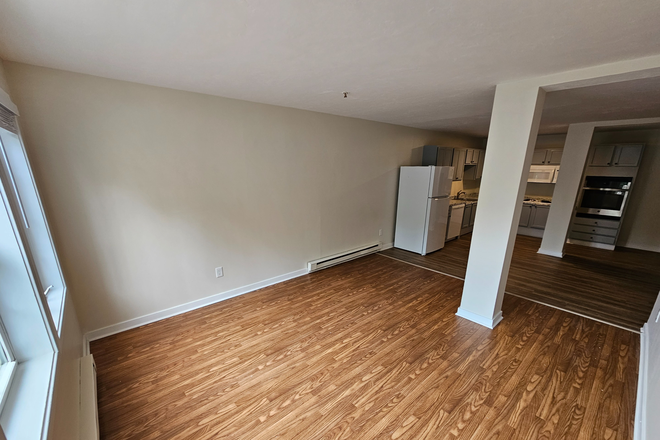 Living Room - Four Bedroom Apartment All Utilities Included!