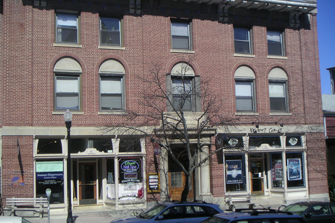 Exterior - Very large open floor plan with vaulted ceilings in living room Apartments