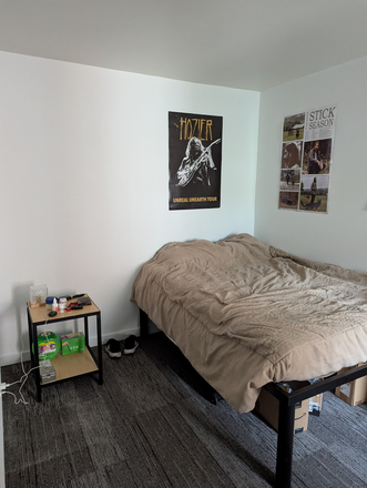 Bed and Nightstand - South Campus Commons 1, All Male Apartment