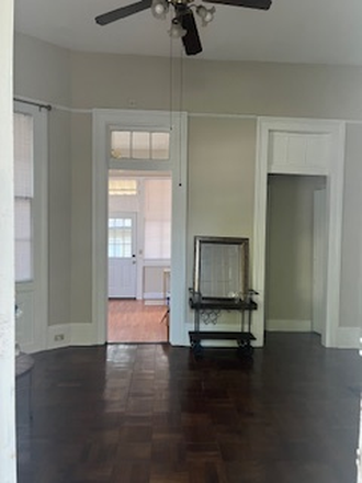 Living Room - LARGE 1-BEDROOM WITH COVERED PORCH AND YARD, HIGH CEILINGS, CLOSE TO CAMPUS Apartments