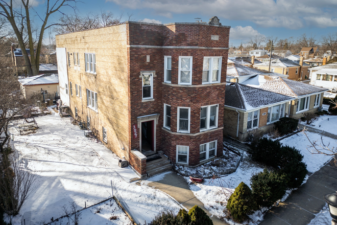 Side View - Conveniently Placed and Well-Maintained Brick Multi-Unit Condo