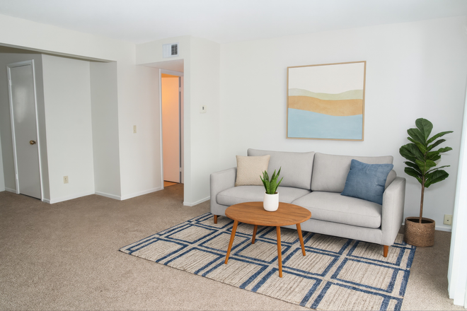 Living Room - large enough for full sized furniture. - Close to UNMC Nebraska Medicine and Blackstone Entertainment District Apartments