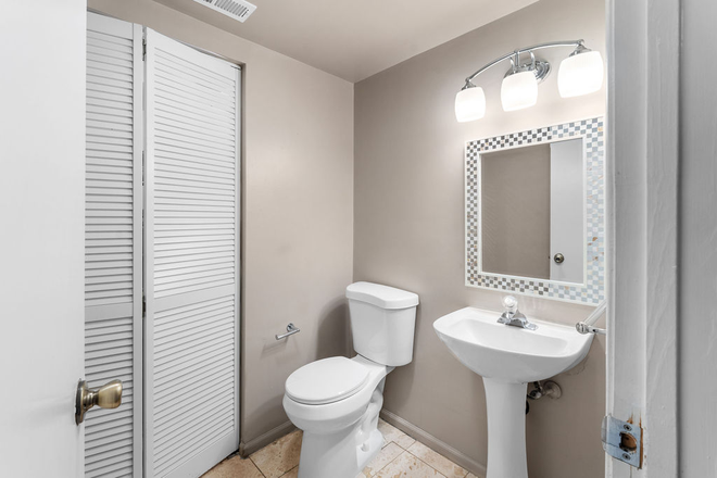 Half bath - Cozy condo near downtown Harbor East neighborhood