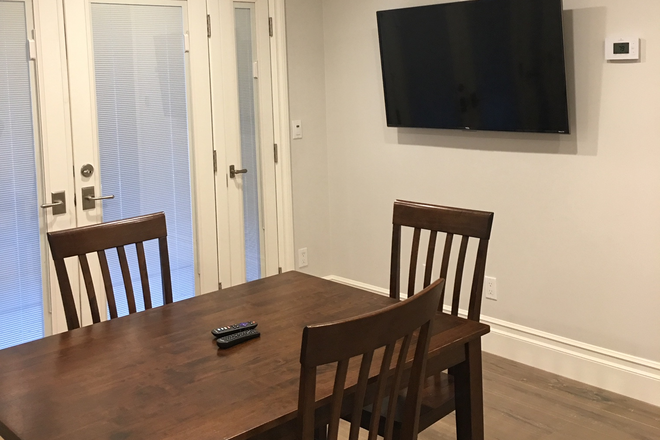 Furnished living room with 50" TV, dining table, love seat sofa - New 1 Bedroom Guesthouse La Canada.유학생 환영