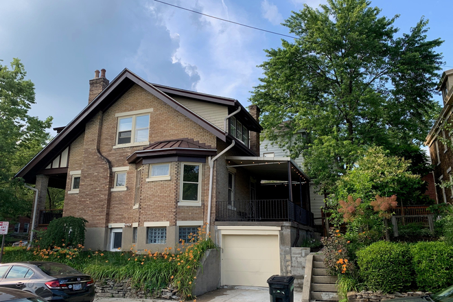 Back porch and yard on Volkert St with Garage - Fully updated, furnished and remodeled home in Clifton Heights (call cell for more information).