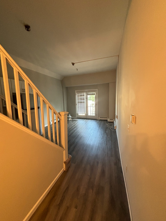 Entry, living room, part of stairs - Beautiful 1 bedroom 1 bath apartment. Close to campus.