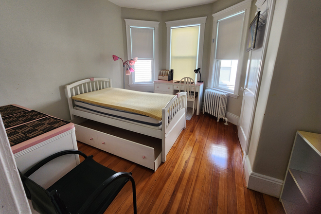 Bedroom view from door in hall - FRNSHD BDRM- 3 bd, 1 ba home, $1400 w lndry/storage, 6 min walk to BC SHUTTLE/ MBTA Trains /Med area