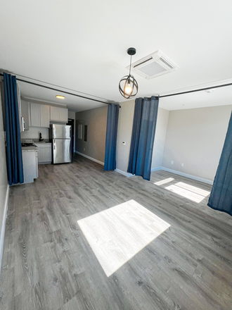 Living Space - 109 W Lexington Apartments, modern, downtown, great transportation options