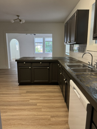 Kitchen looking at dining/living area - FONDREN house for rent - completely redone - close to Fondren business district and UMMC.