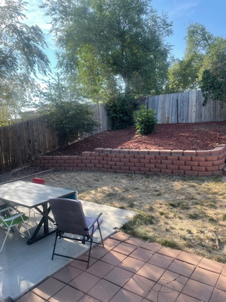 fenced-in backyard - Fully furnished 3 bedroom, 2 bathroom W/D in unit and utilities paid. House