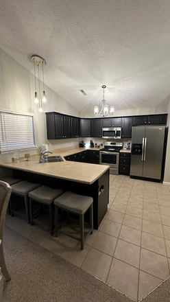 Large Kitchen that is stocked with cookware, plates, glasses, and utensils. Everything you need in a home! - Fully furnished 2 BR, 2 full bath, 2 car garage with patio for rent during 26-27 period.
