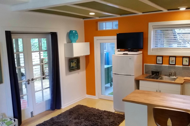 view from bed looking toward the bathroom - urban hideaway in candler park