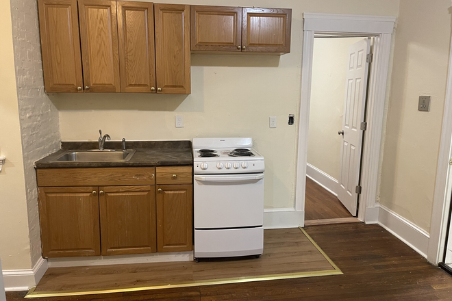 visit hubrealtyproperties.com - Fenway, front facing two bedroom with renovated kitchen and bathroom