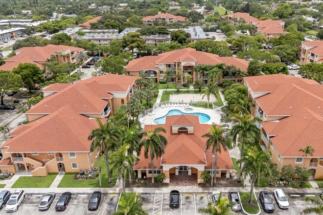 Aerial View of the Community - Prime Location! Split Floor Plan 2BR/2BA Apartment – Walking Distance to NSU at The Courtyards