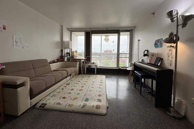 Living room - Furnished HUH Peabody Terrace 1BR Near Harvard Square | 16th Floor River Views | Below Market Rent